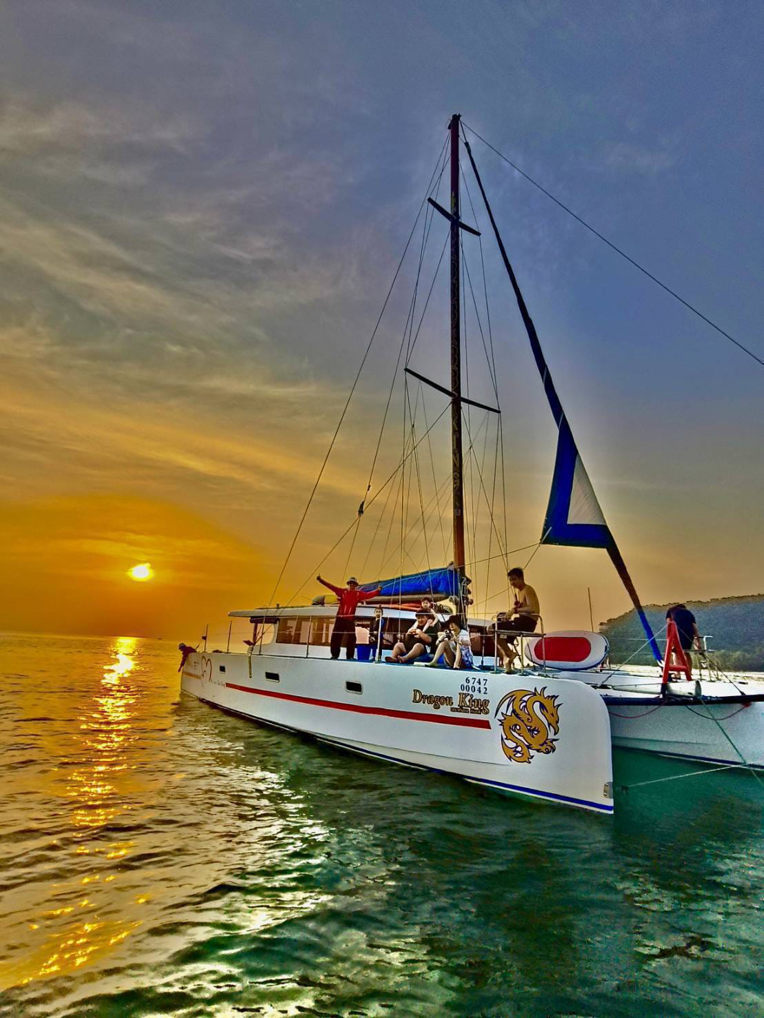 Private charter boat anchored near the beach of Koh Tan