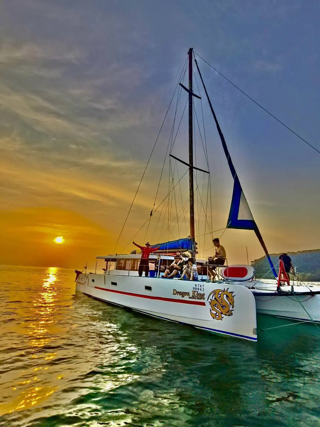 Private charter boat anchored near the beach of Koh Tan