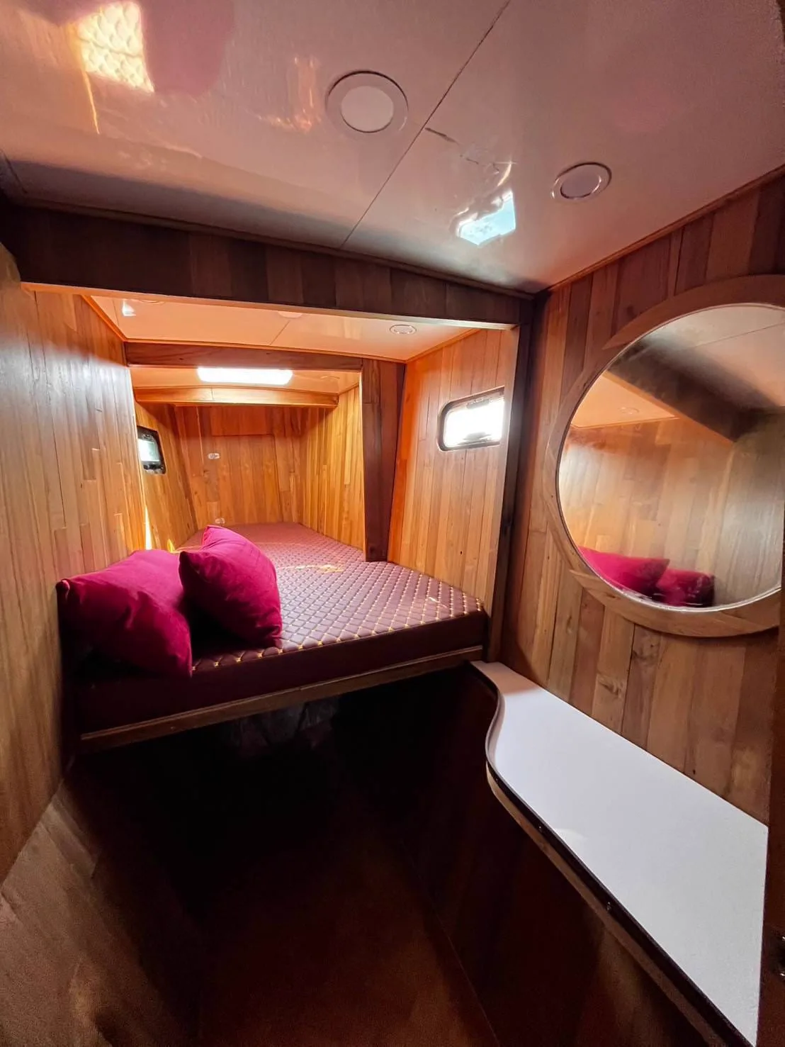 Private cabin with double bed on board the charter boat